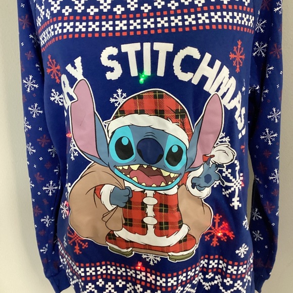 Disney Women’s Blue Holiday Sweater With Blinking Lights on Stitch & Snowflakes - Picture 2 of 5